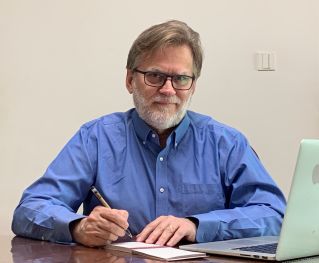 Close-up of a wheat field captured during a beautiful sunset, showcasing golden hues.